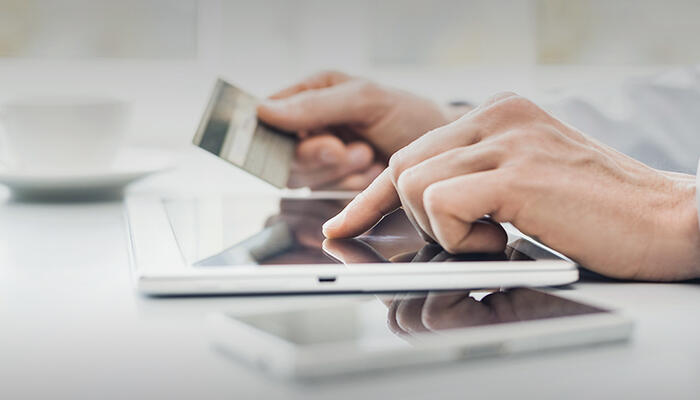 Making a payment in an app on a tablet