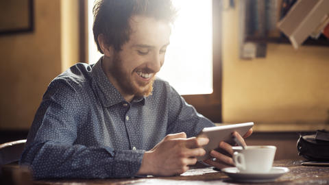 Millennial on mobile device Millennial on mobile device