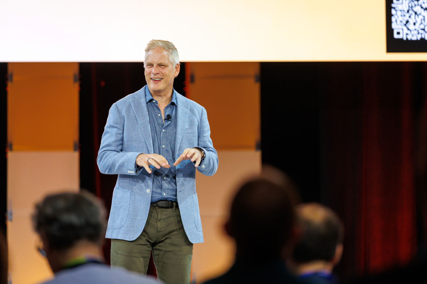 Norm De Greve speaking at an MMA summit